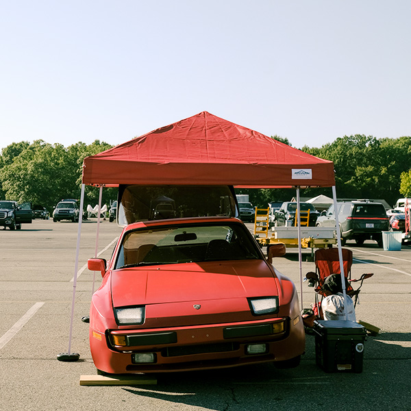 Red Porsche in pit area